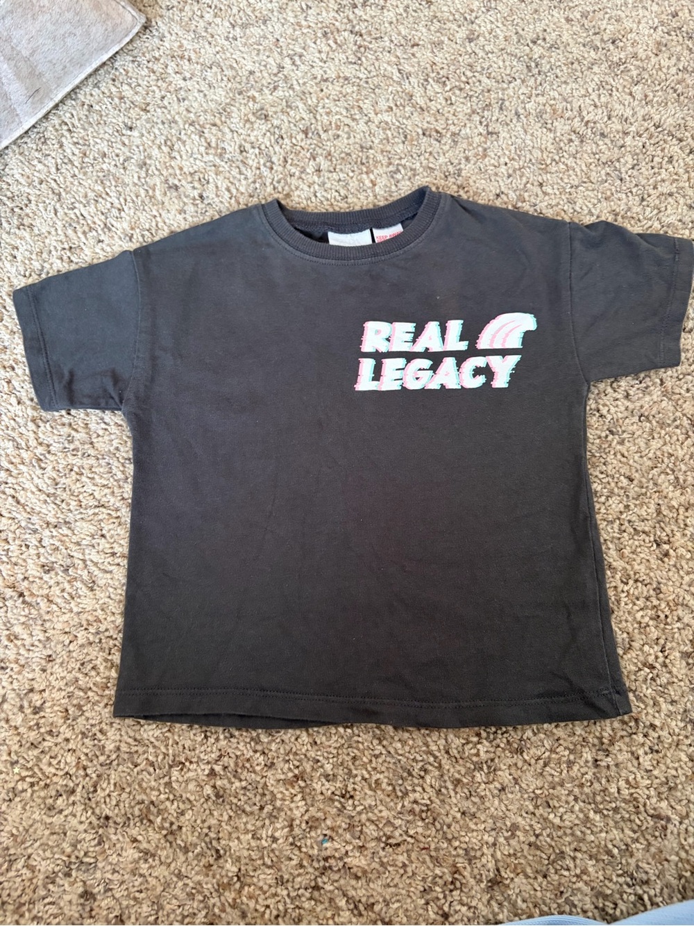 Legacy dark gray toddler Short Sleeve Tee with 'Real Legacy' Graphic